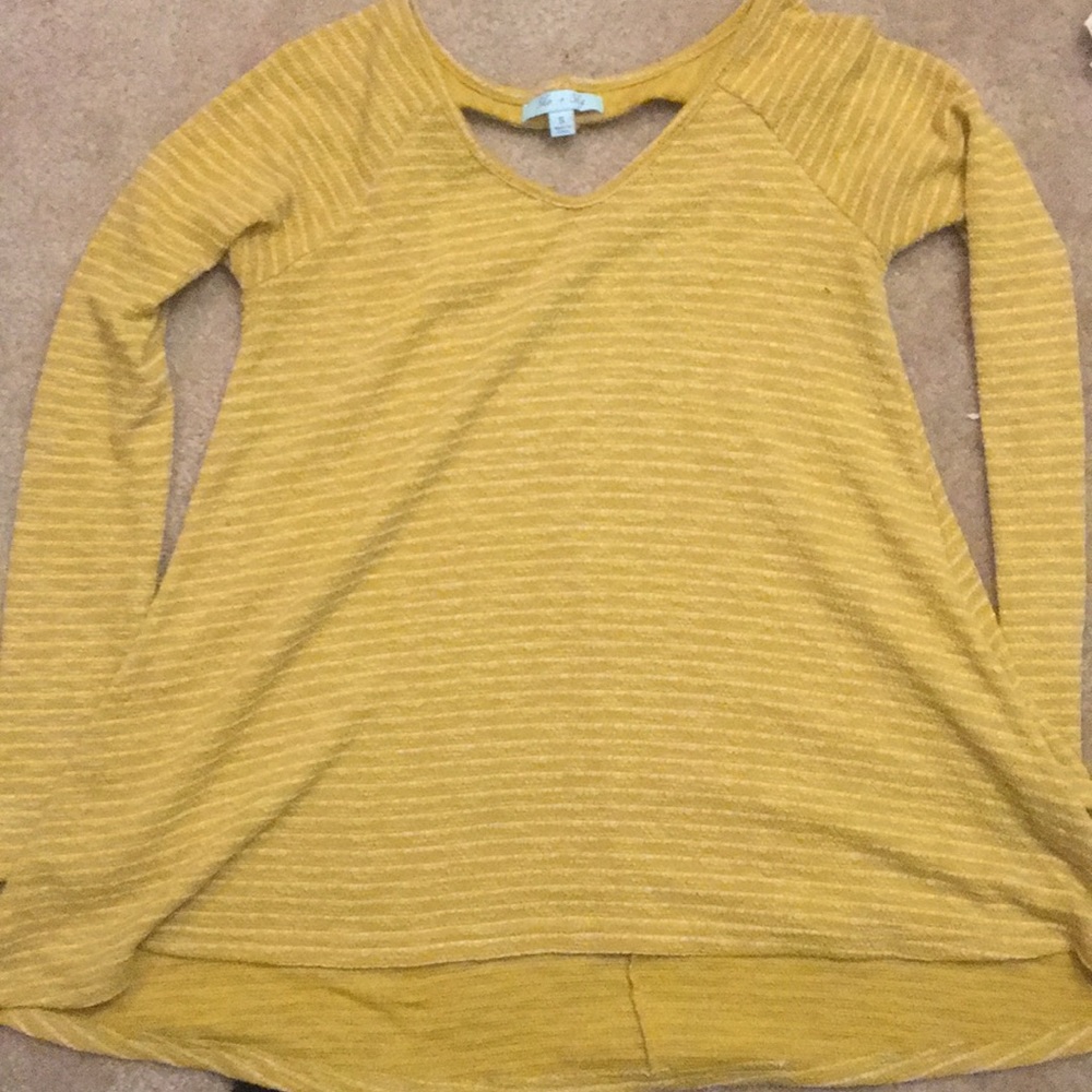 Long sleeved yellow top with open back